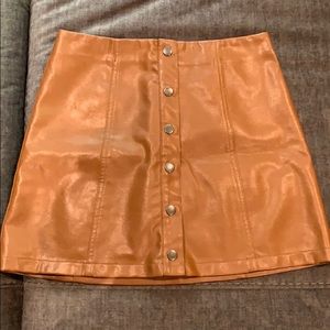Dark brown button down leather skirt